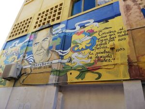 Muurschildering van 'Hidden hero' Medardo de Marchena door Avantia Damberg